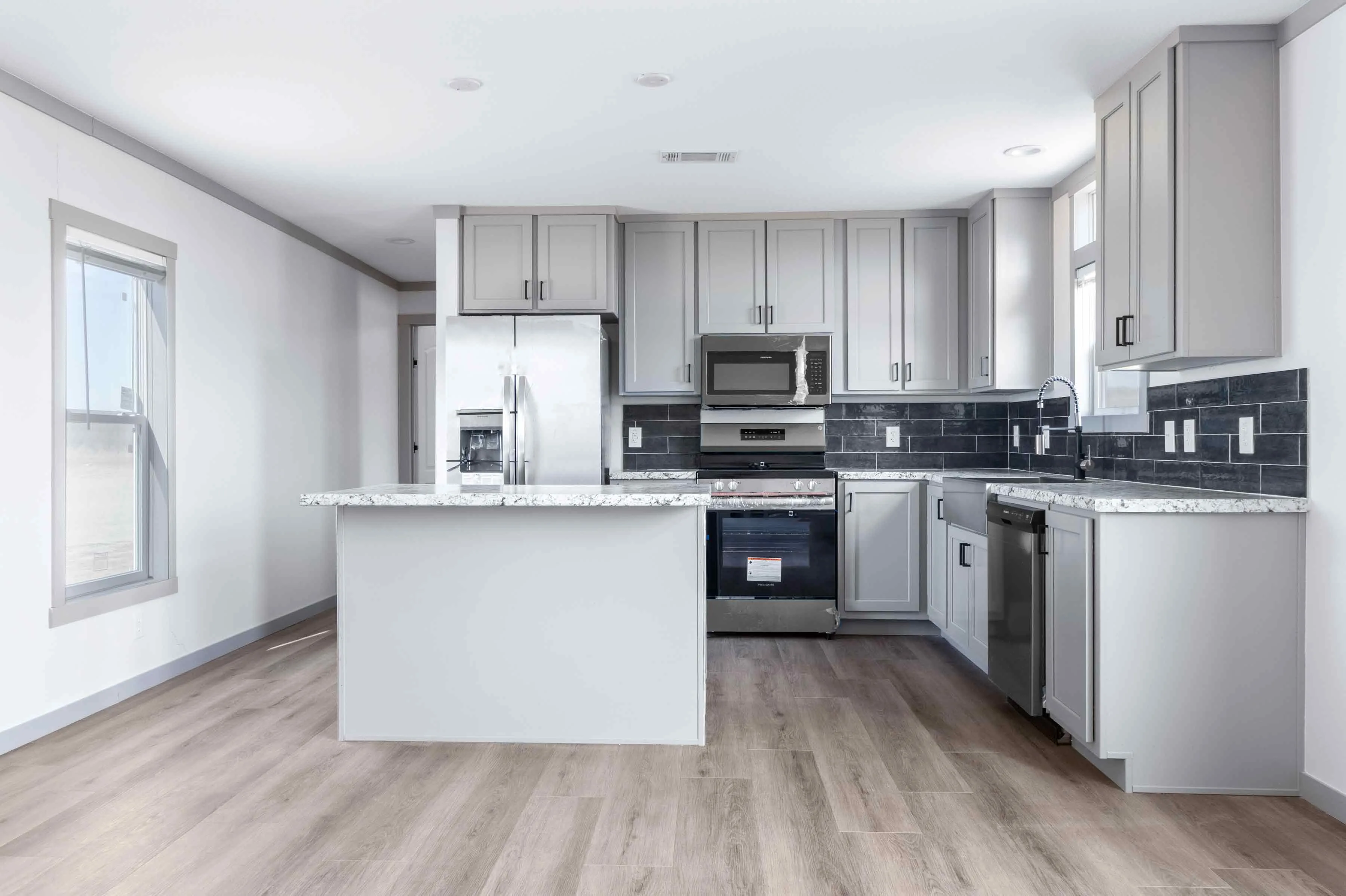 manufactured home builders in Texas with custom kitchen designs and stainless steel appliances Marathon Homes Breckenridge TX